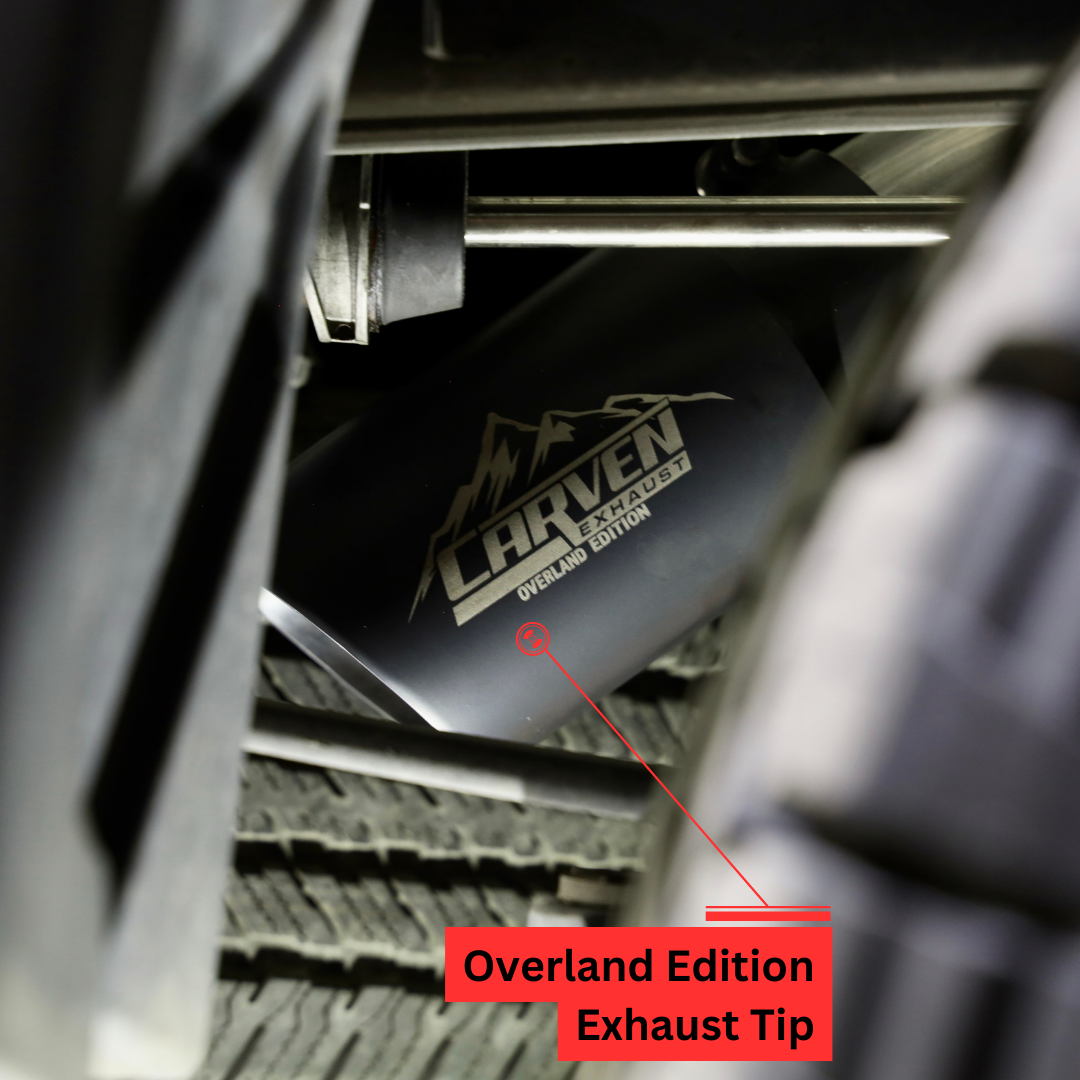 A close up of the Carven Logo printed on a black exhaust tup installed on the underside of a vehicle with text that says "Overland Edition Exhaust Tip"