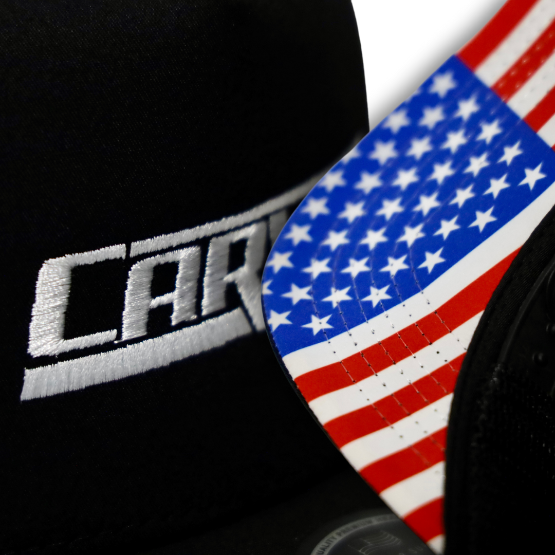 A detail shot of a black hat's American flag brim