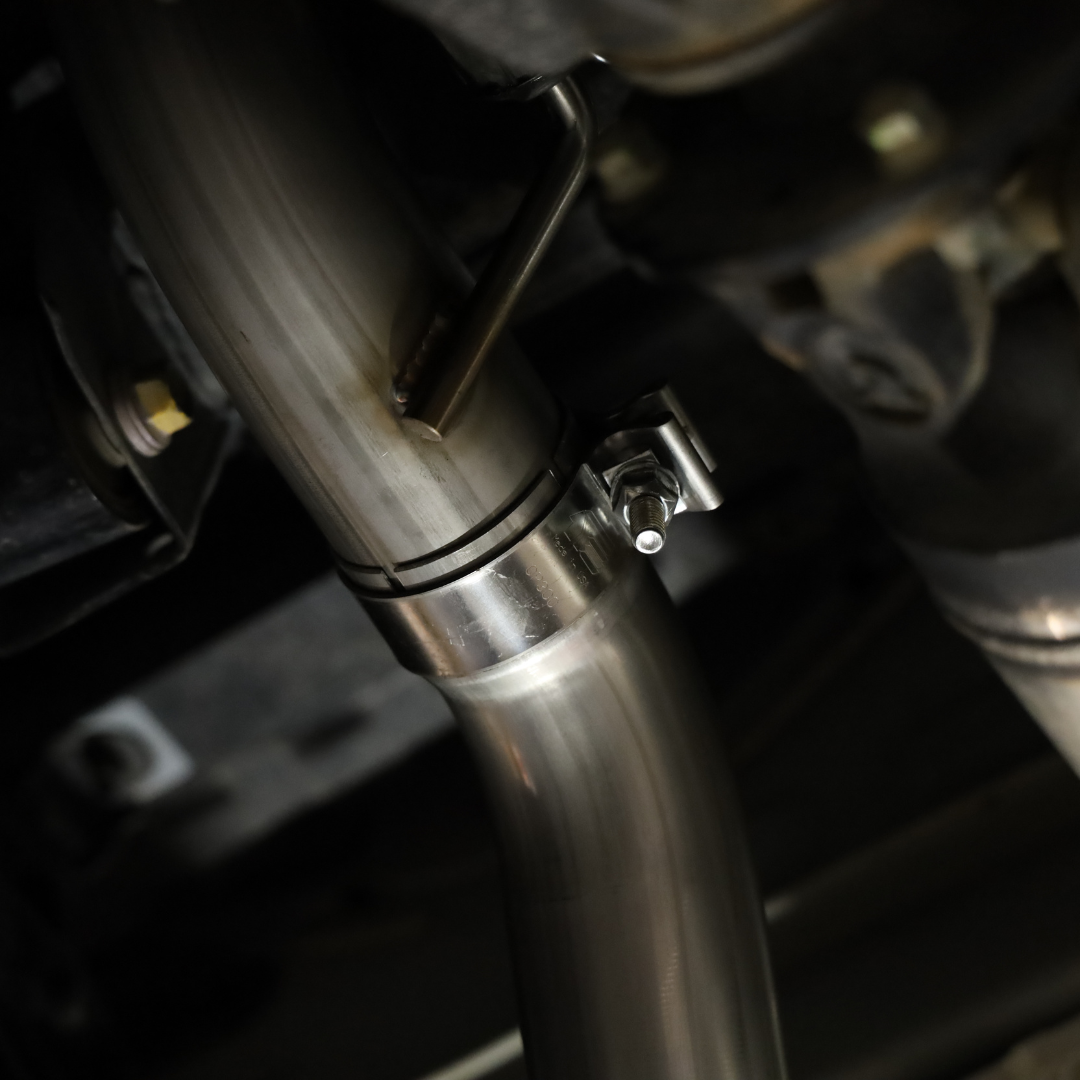 Another angle of the bolts on an installed 2022-2025 Toyota Tundra Carven Exhaust Signature Clamp Back Kit