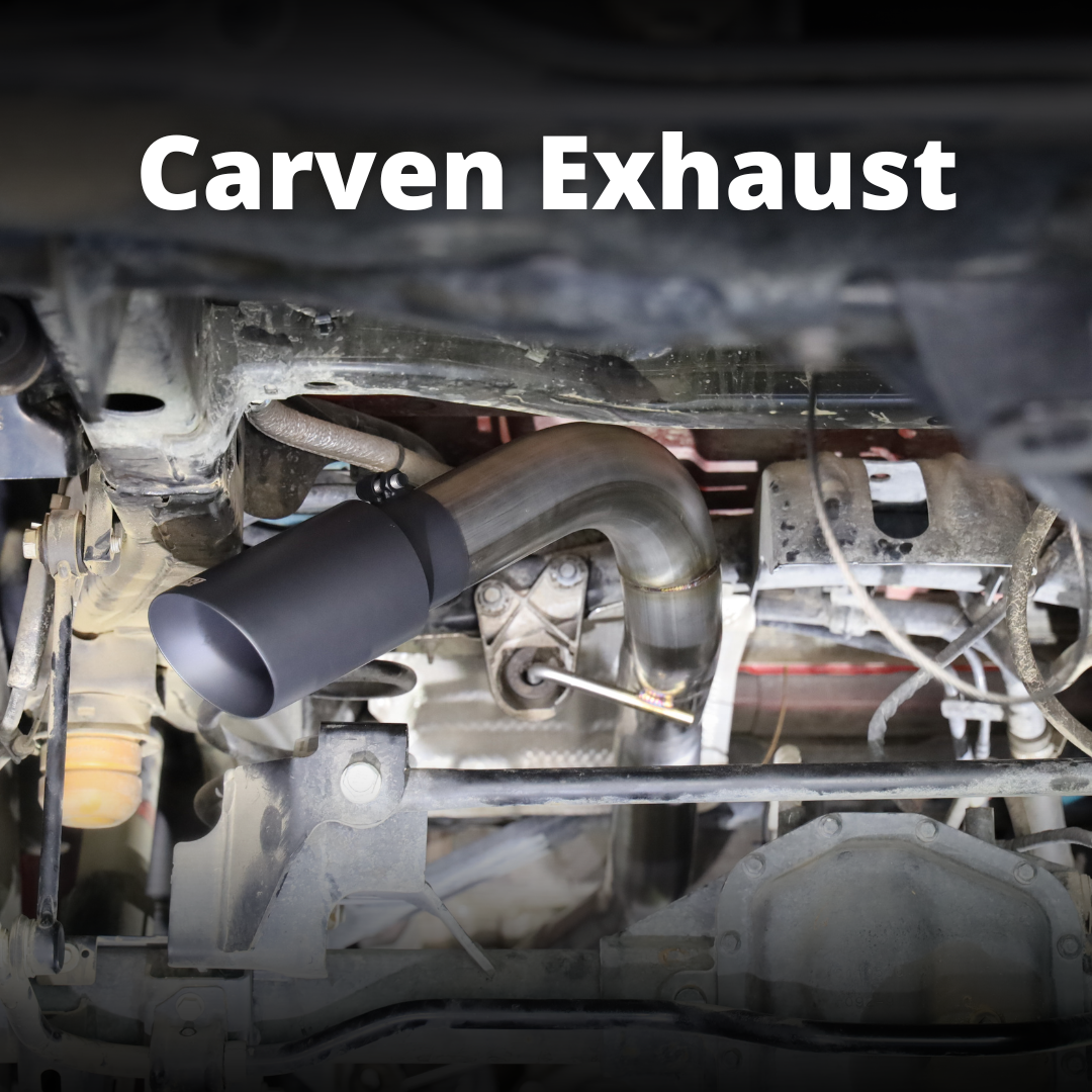 A close up of an installed 2020-2025 Jeep Gladiator Carven Exhaust Over Axle Dump Exit Exhaust System with text that says "Carven Exhaust"