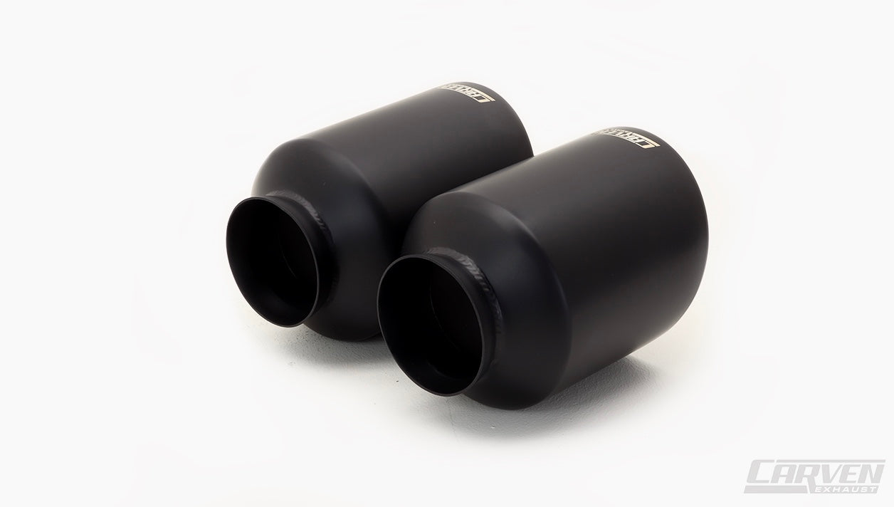 Product photo showing the backside of a 2015-2023 Dodge Charger Carven Exhaust 5.0" Tip Replacement Set in the ceramic coated black color