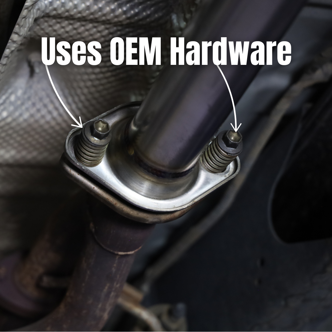Close up of the 2005-2015 Toyota Tacoma 4.0L Short Bed Carven Exhaust Dump Exit Exhaust Kit's OEM hardware