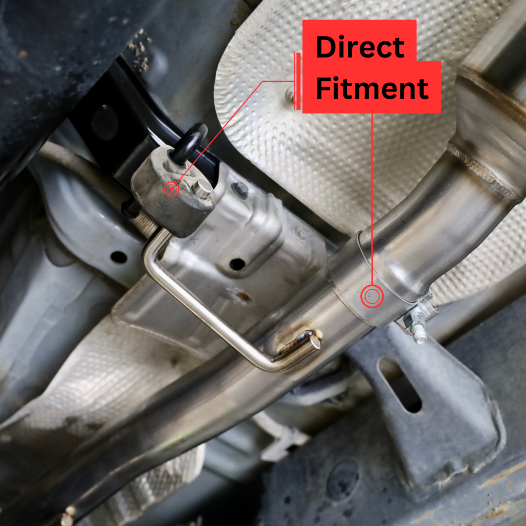 An alternate angle close up of the underside of a vehicle with an installed 2003-2024 Toyota 4Runner Carven Exhaust High Clearance Dump Exit Exhaust System and text that says "Direct Fitment"