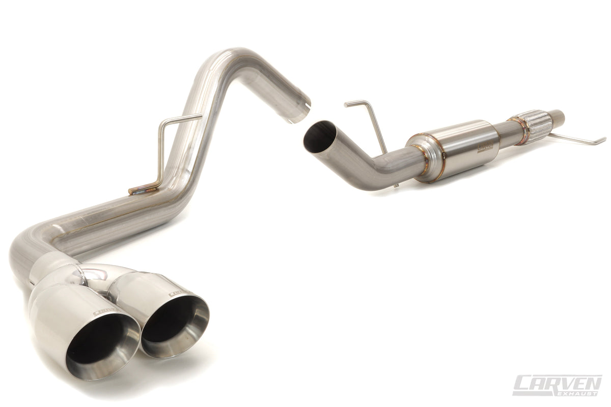 A product photo of a 2015-2020 Ford F-150 EcoBoost Carven Exhaust Cat-Back Kit with 4” Dual Exit Tips in the polished stainless color