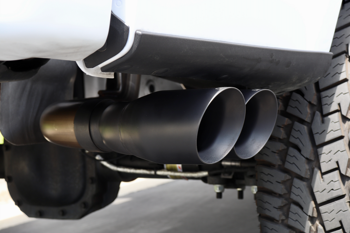 An alternate close up of installed Dual Exit Tips in the Cerakote black color